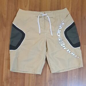 Maui and Sons Black Logo Tag with Red, Green, Yellow, Blue Accents